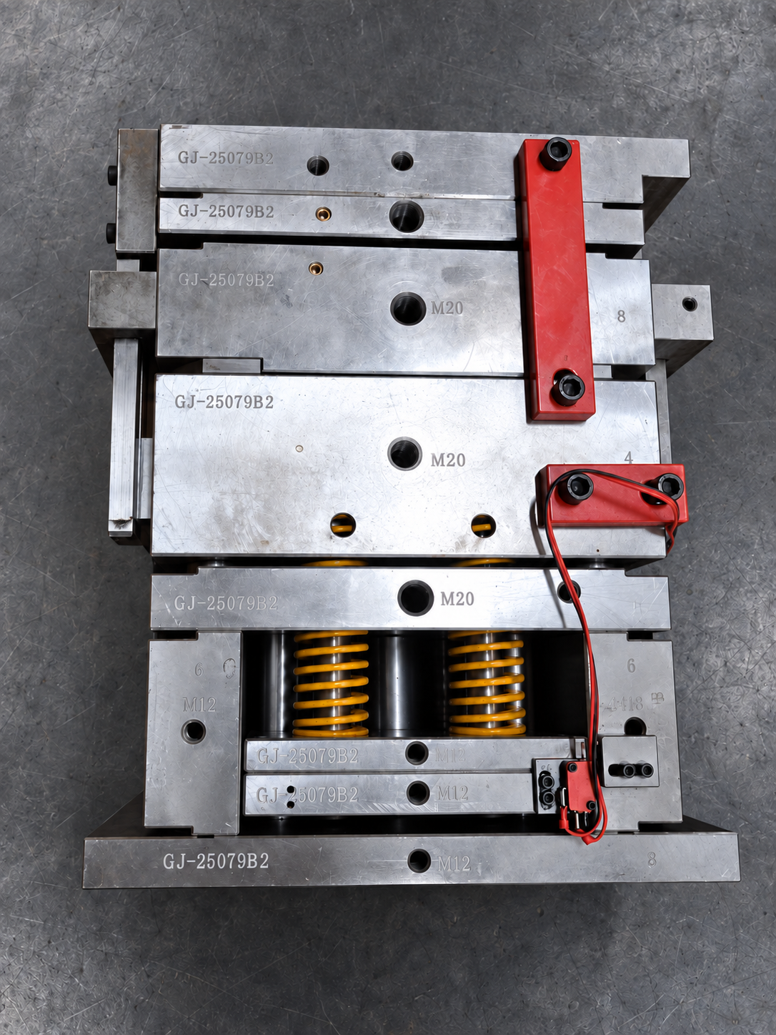Top view of transferred injection mold showing plates springs and components