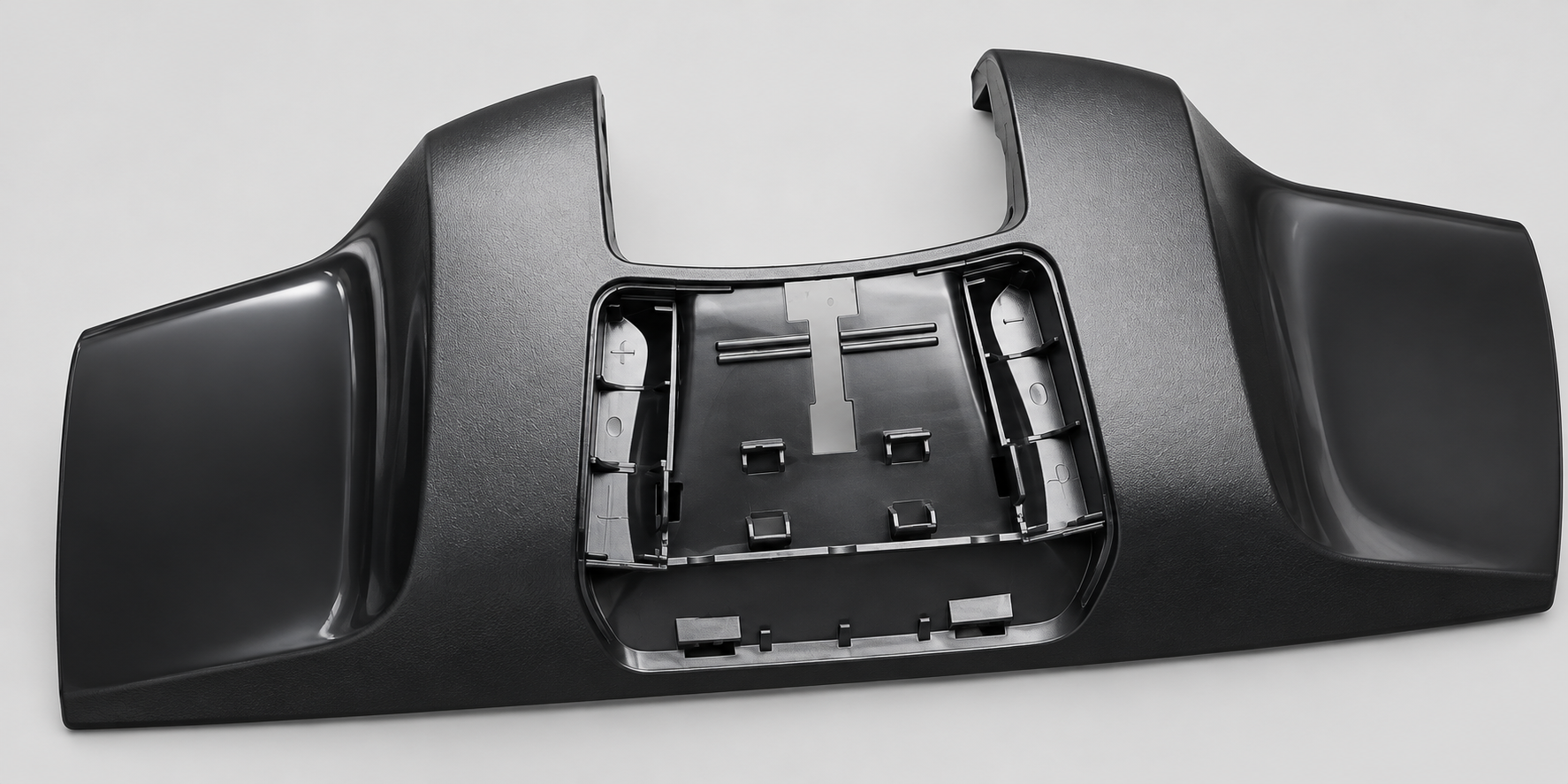 Finished black molded interior trim component
