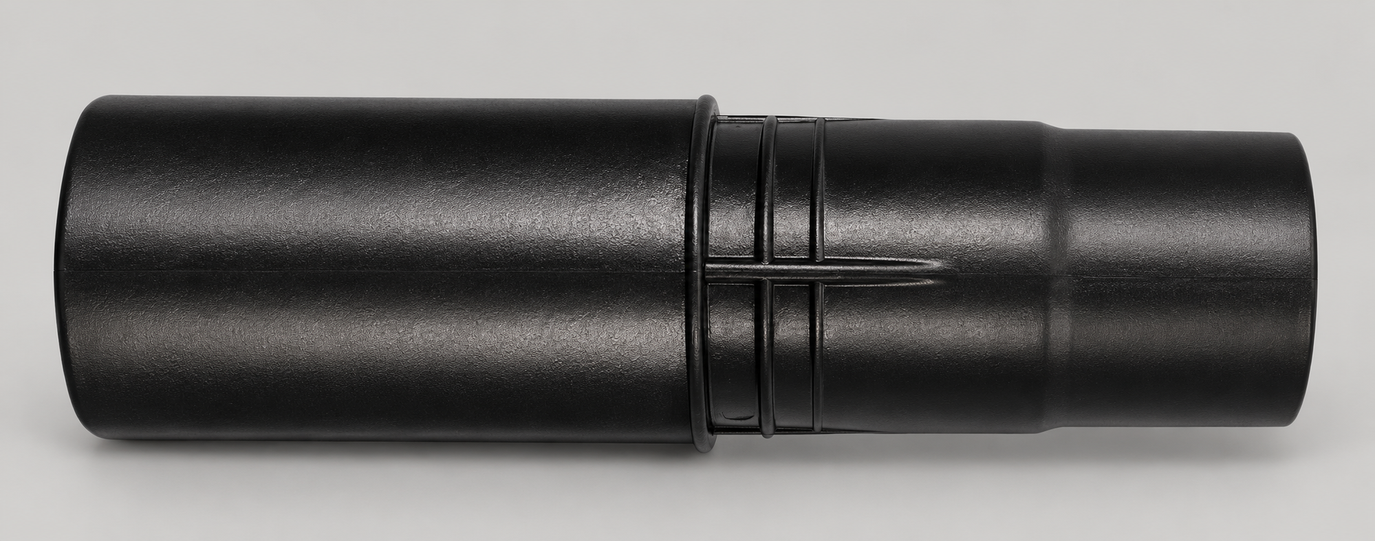 Finished black cylindrical injection molded component